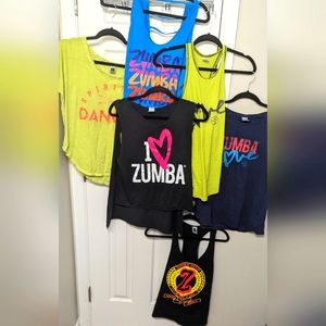 7qty all size mediums Zumba tees and tanks
